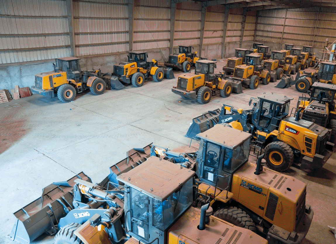 Warehouse of wheel loaders and heavy machinery